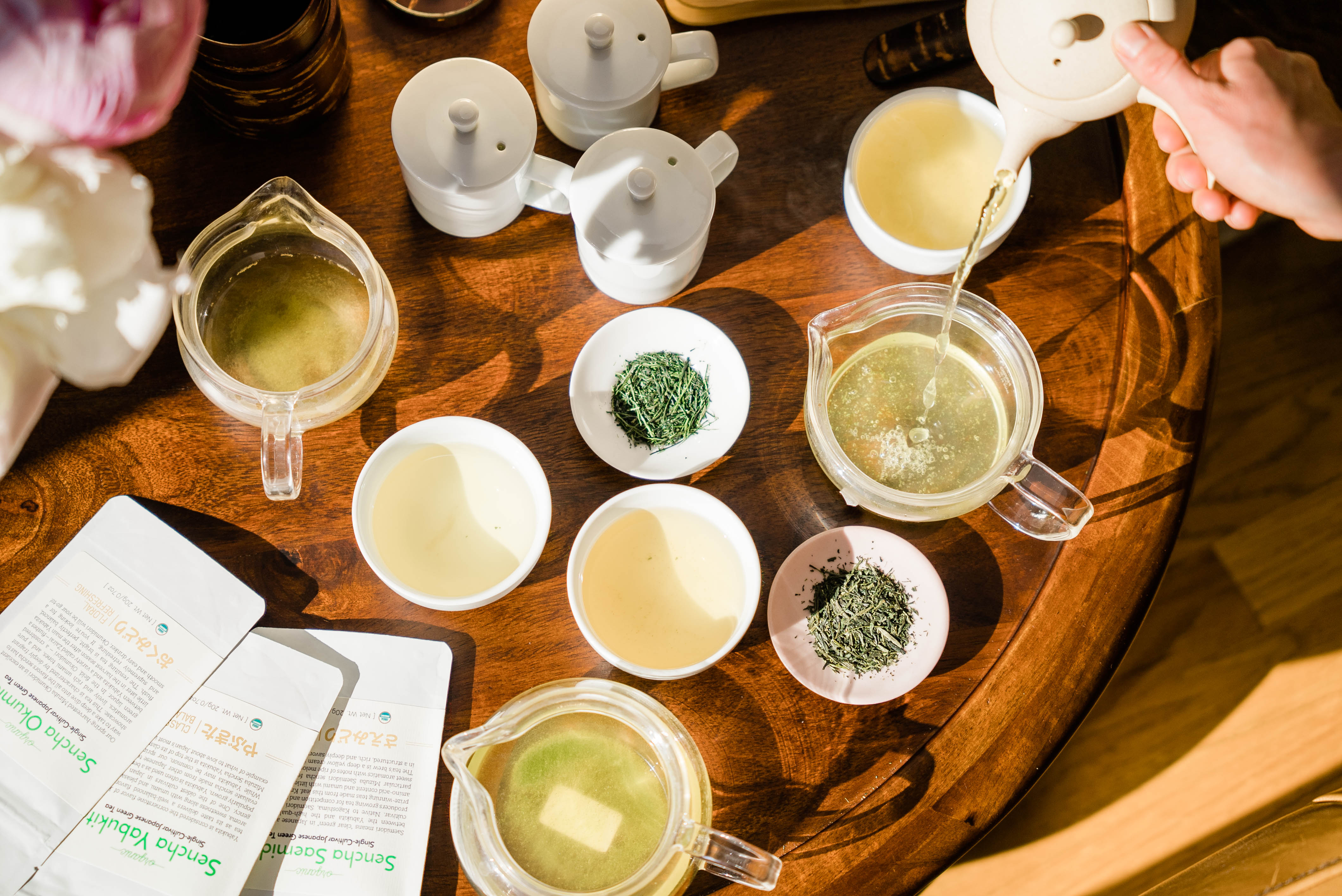 Multiple Japanese Teas arranged on a wooden table