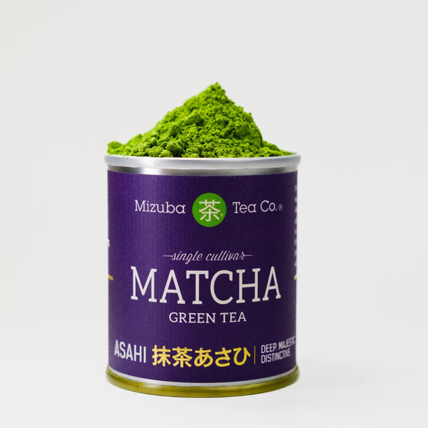A noble, purple tin of matcha green tea, featuring vibrant matcha at the top