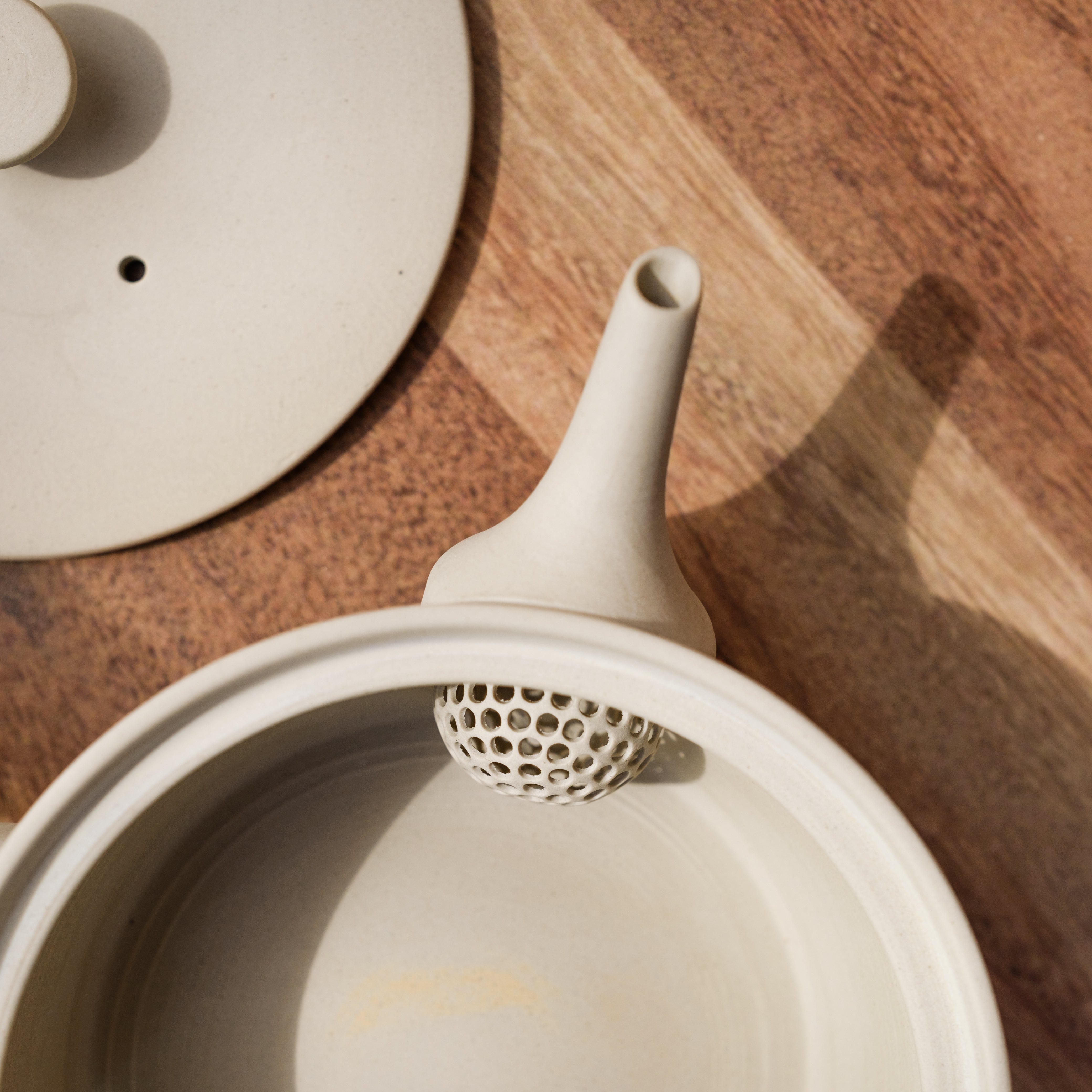 Inside a handmade Japanese kyusu ceramic strainer - Mizuba Tea Co.