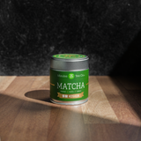 Matcha Green Tea Koshun Tin on wood table
