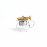Hario glass and olive wood tea pot with built-in metal strainer for loose leaf tea.