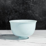 Blue porcelain chawan matcha tea bowl on a table - Mizuba Tea Co.