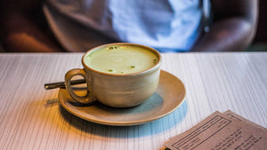 Cup of Matcha Latte at a coffee shop 