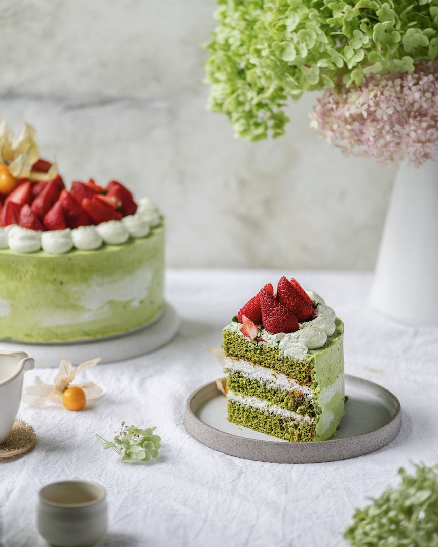 Slice of Mizuba Matcha green tea layered birthday cake