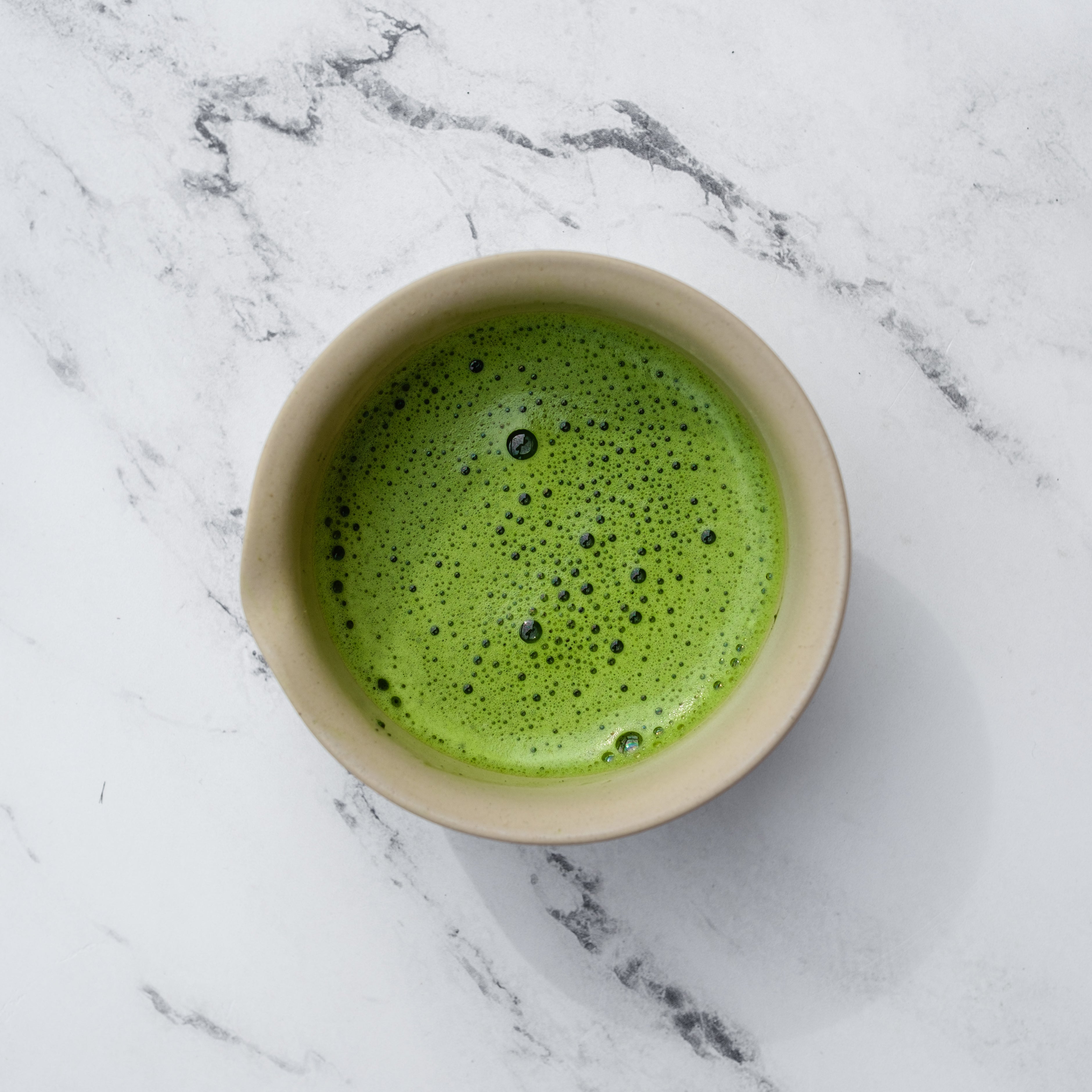 Frothy matcha freshly whisked in a Nankei Ceramic bowl - Mizuba Tea Co.