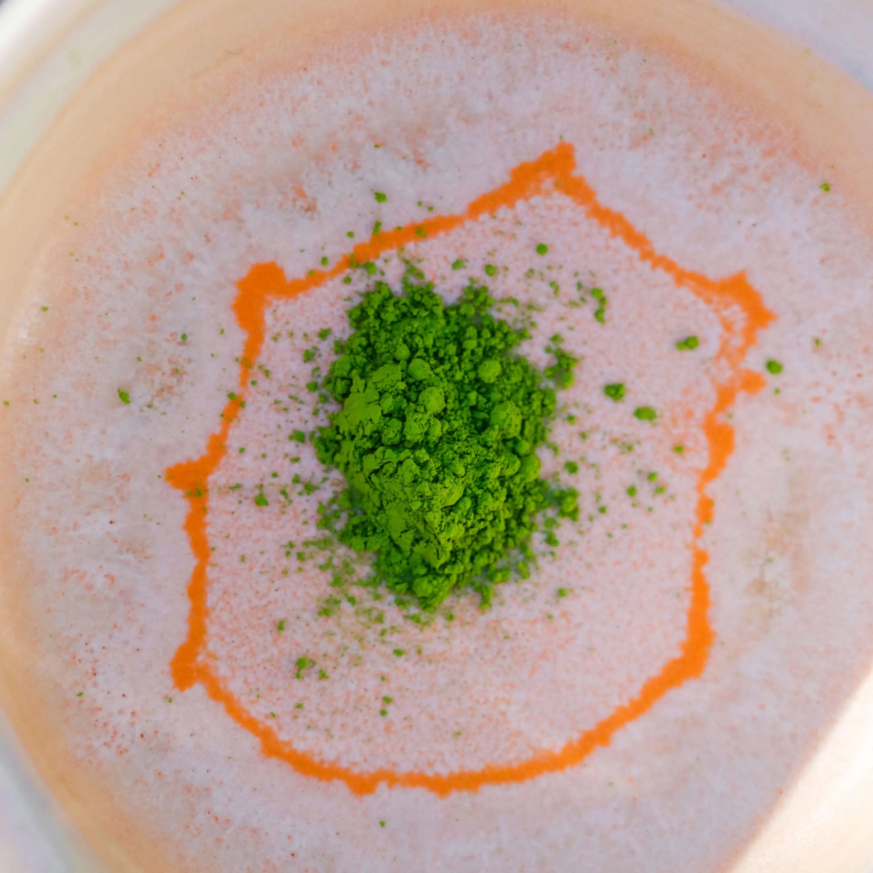 Mizuba Matcha green tea featured in a handmade rose quartz chawan bowl.