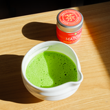 A freshly whisked bowl of Uji ceremonial matcha green tea by Mizuba Tea Co.