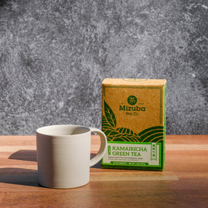 white sandstone mug with Japanese green tea sachets by Mizuba Tea Co.