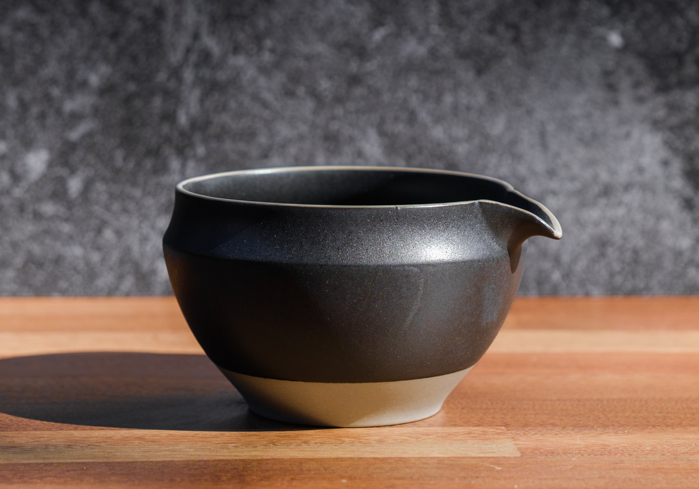 Spouted matte black minimalist matcha green tea serving chawan by Origami