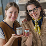 The founder of Sugarpine Drive-in and Mizuba Tea Co. hold their respective gourmet food products: miso caramel sauce and hojicha powder.