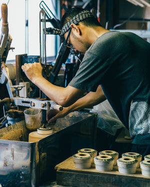A potter working in his studio in Japan