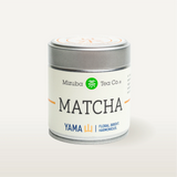 Yama matcha tin on a white background
