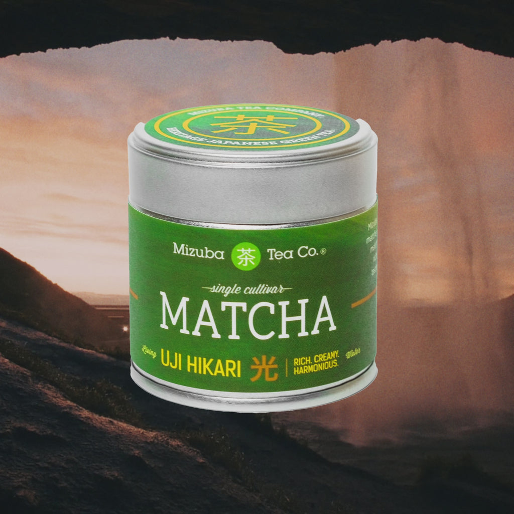 A tin of Uji HIkari Japanese ceremonial matcha superimposed on a waterfall scene - Mizuba Tea Co.